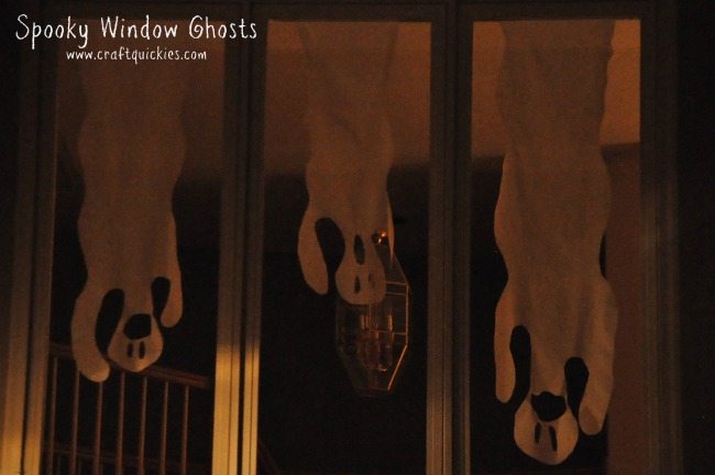 These spooky window ghosts are a super cheap decoration that the whole family can make together!  They have some seriously spooky curb appeal!