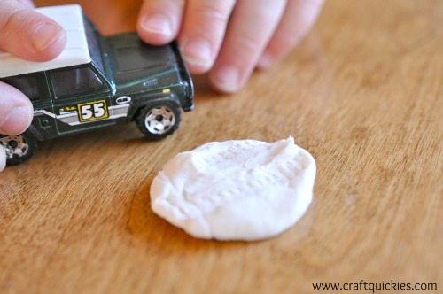 Pottery Barn Holiday Handprint Ornament tire tracks