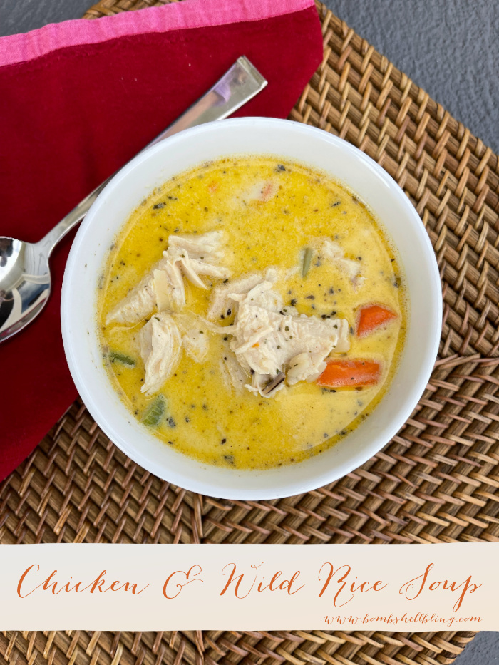 This chicken and wild rice soup recipe is rich, hearty, and sure to impress! Serve it as is or in a bread bowl! YUM!
