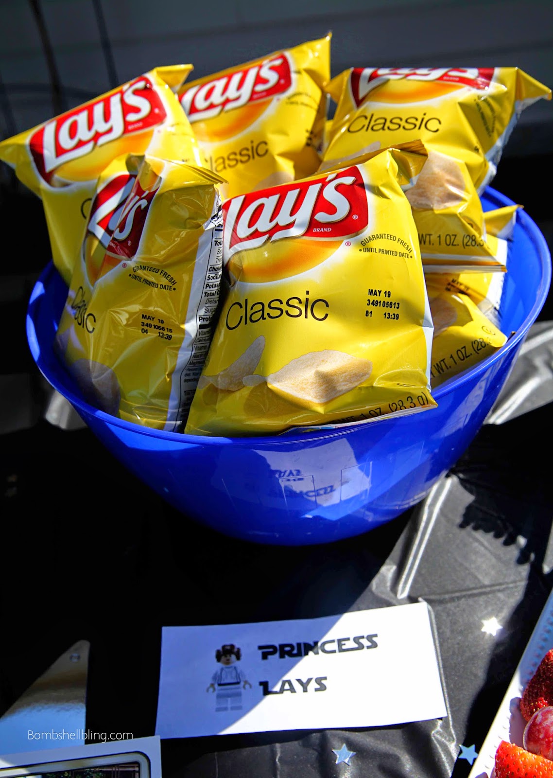 Star Wars Lego party table with lays chips in blue bowl