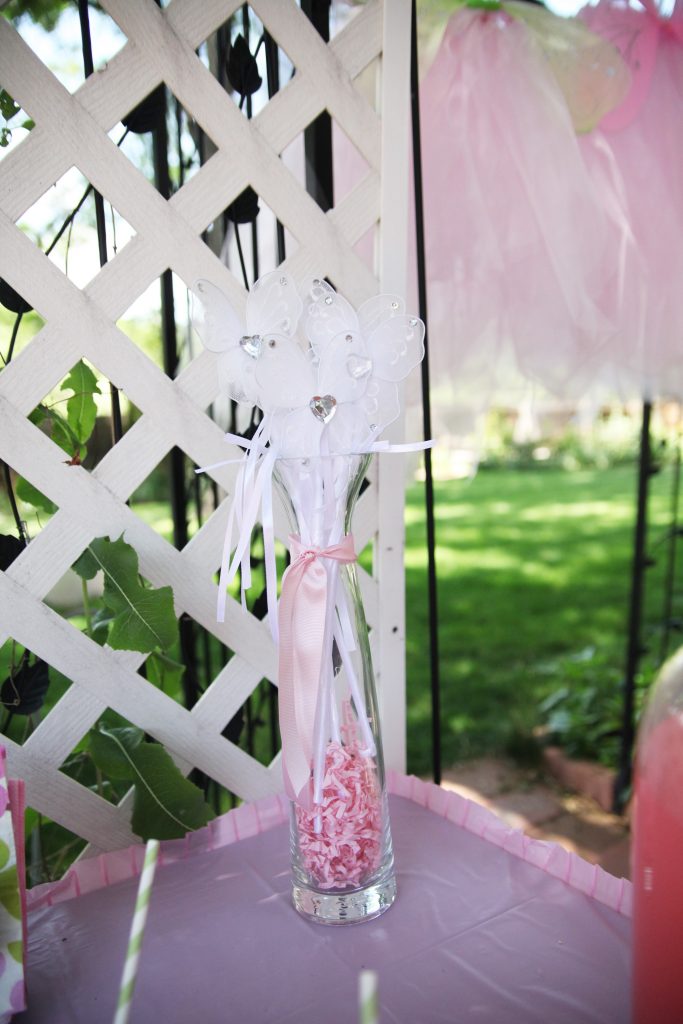 Fairy wands in glass vase at fairy birthday party