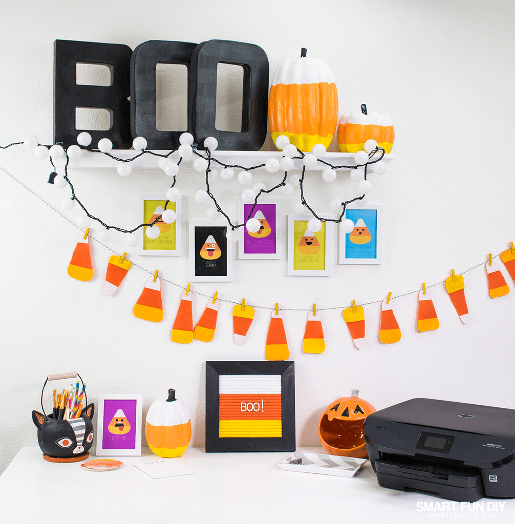 This adorable handmade felt letter board in candy can colors DIY will save you money making this festive and fun decor item for your Halloween home!