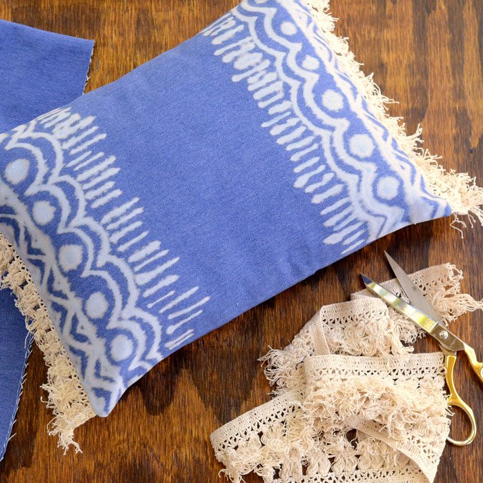 Bring an easy-going summer vibe to your front porch with this Boho bleach denim pillow! The bleached designs and fluffy cotton fringe remind me of music festivals and laid back days at the beach.